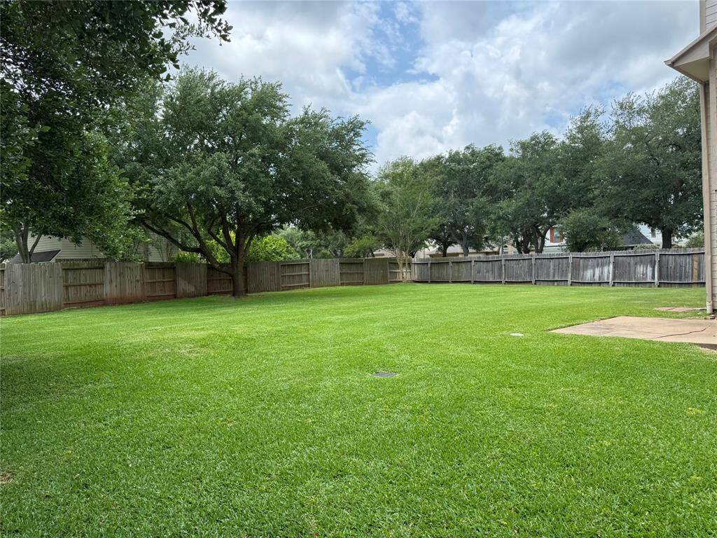 Another view of the Backyard from side of the home.