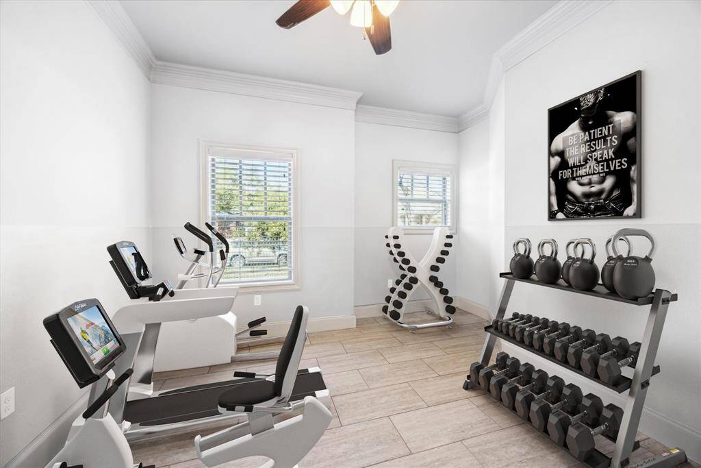 FLEX ROOM OFF OF THE PRIMARY SHOWN HERE VIRTUALLY STAGED AS A HOME GYM.