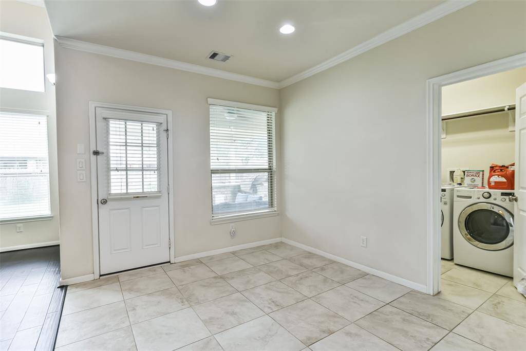 The breakfast room features awindow with views in your backyardnext to the back door.