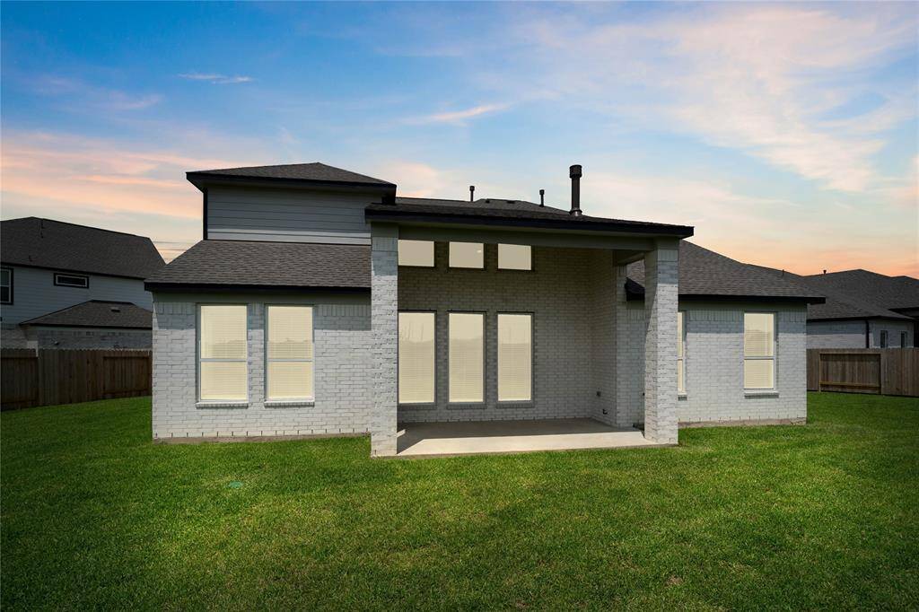 This backyard is enjoyable for everyone! From pets playing, kids jumping on the trampoline, or even having a garden, this amazing backyard and its covered patio provides space for endless activities for the whole family!