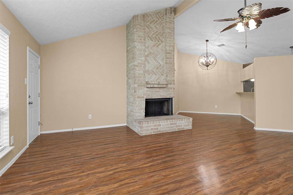 Floorplan is perfect for entertaining or just sitting back with a good book enjoying the crackling of your two-sided corner woodburning fireplace.