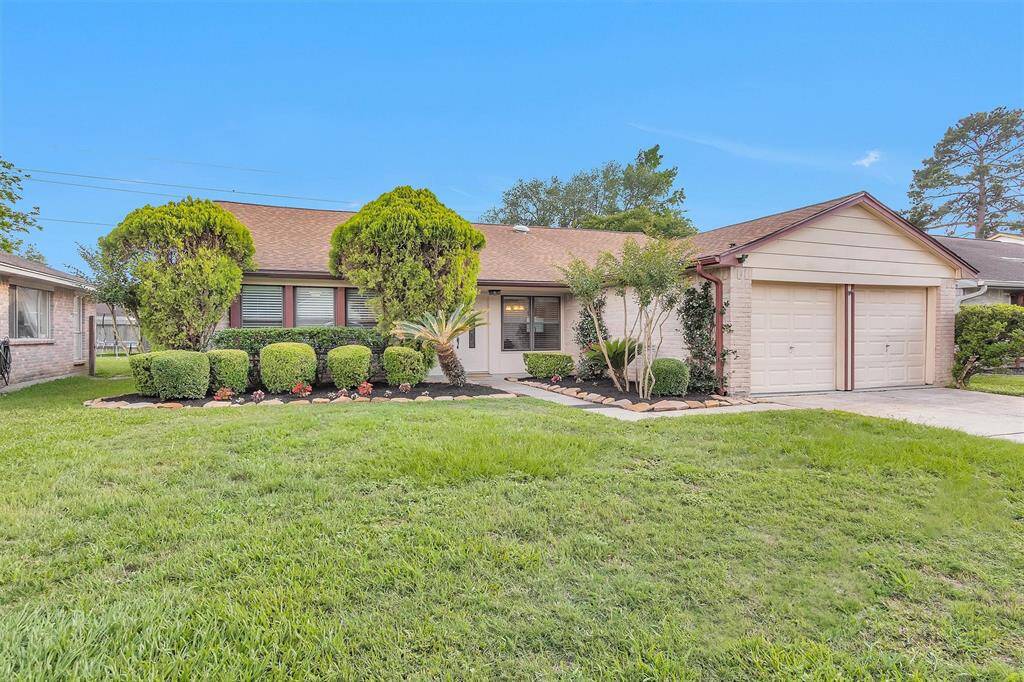 Home boasts mature landscaping and crape myrtles will be blooming soon for a beautiful display of color.