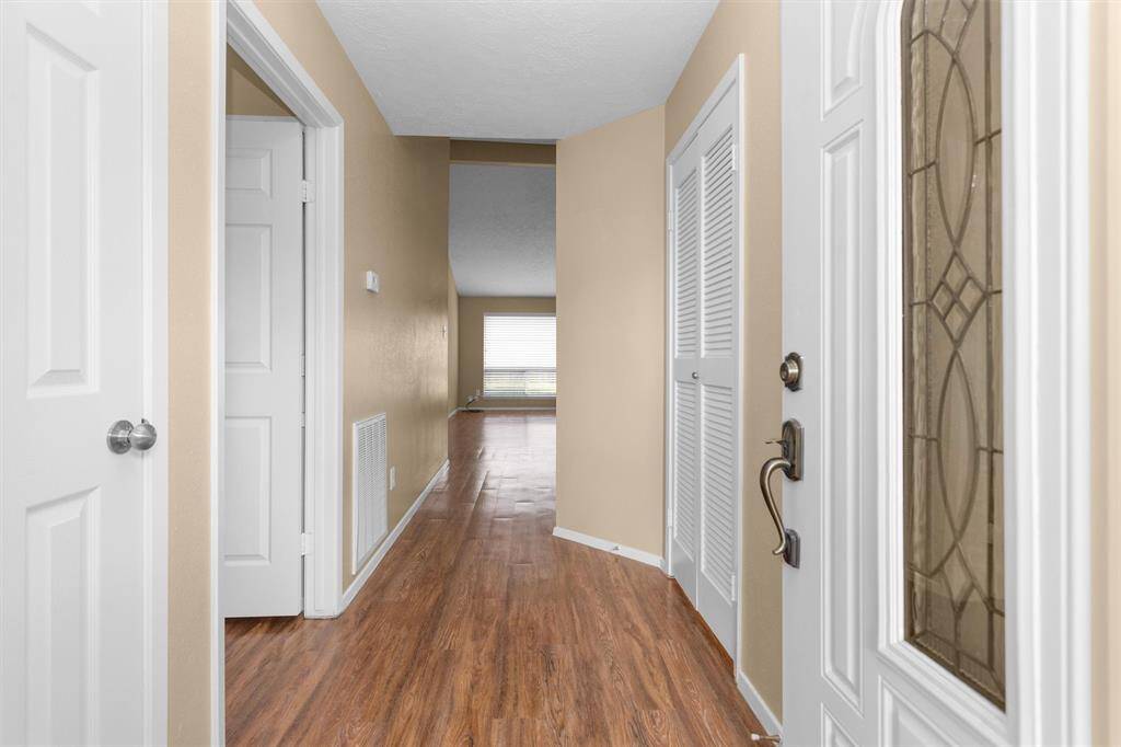 Entry with coat closet to the left.