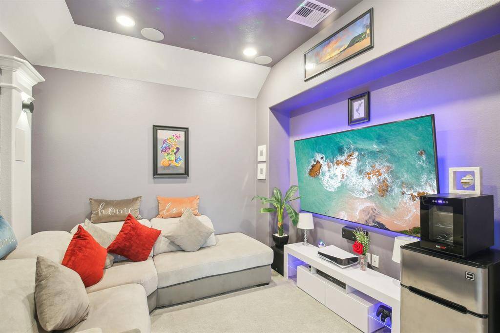 This cozy home theater is the perfect entertainment retreat.