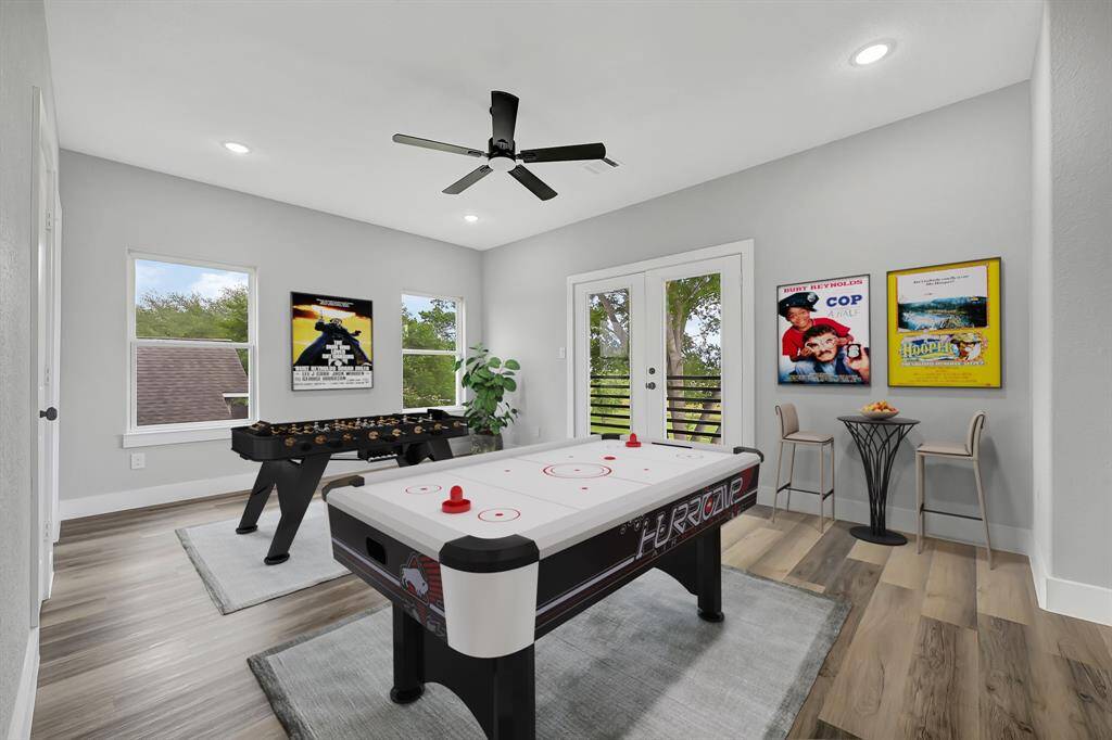 STAGED PICTURE OF GAMEROOM/BEDROOM