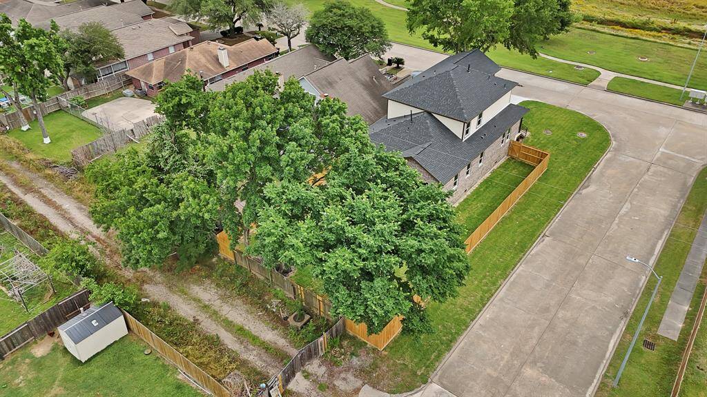 FULLY FENCED BACKYARD WITH 12 FOOT GATE