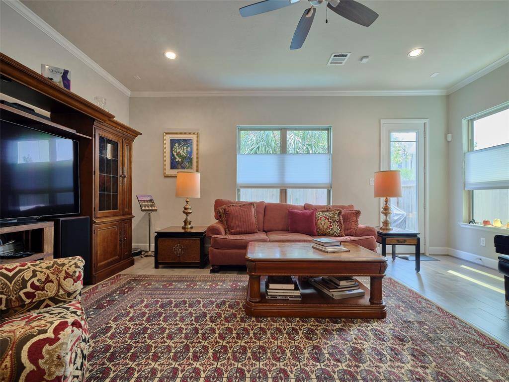 The living room offers lots of natural lights