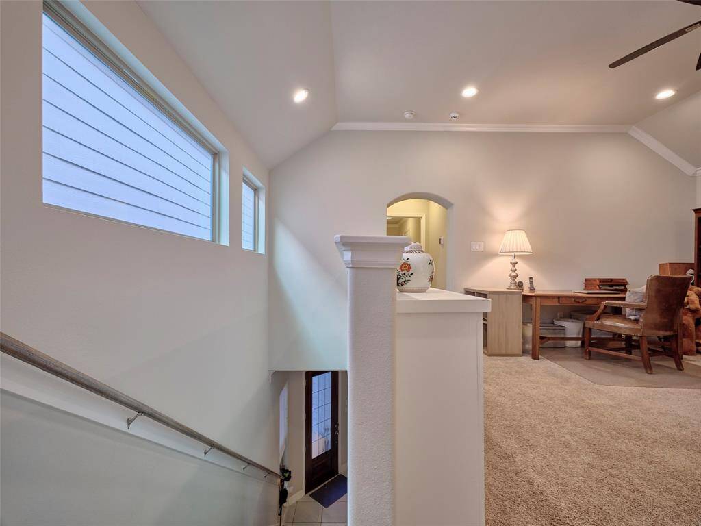 The energy-efficient transom windows illuminate the Staircase with natural light
