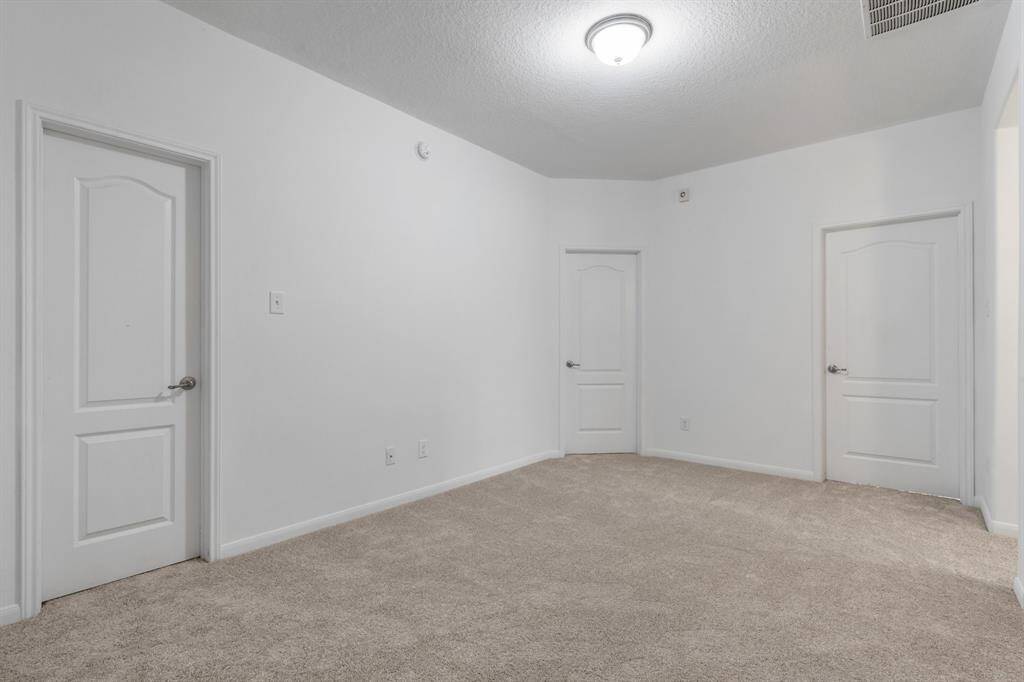 Second-floor game room/sitting area between bedrooms