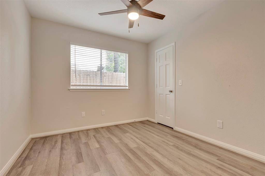 Spacious third bedroom, ideal for guests, a home office, or additional living space.