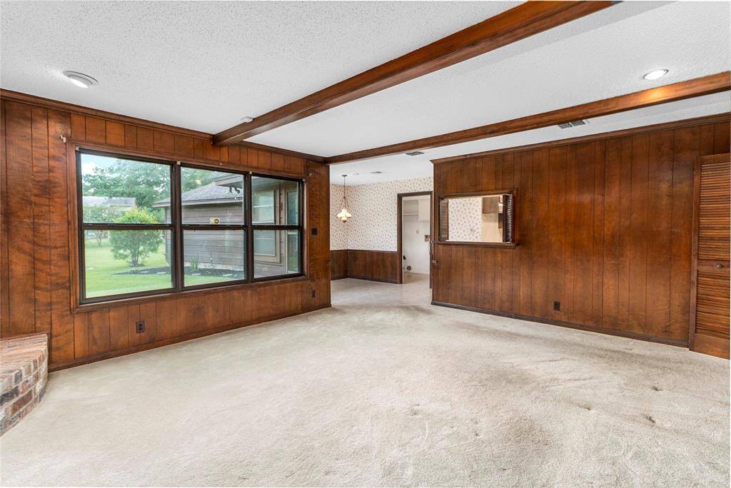 Family Room w/Wood-burning Fireplace! Beamed Ceiling & Built-in Cabinets! View of Park-like Backyard! French Door to Patio! Connects to Breakfast Room!