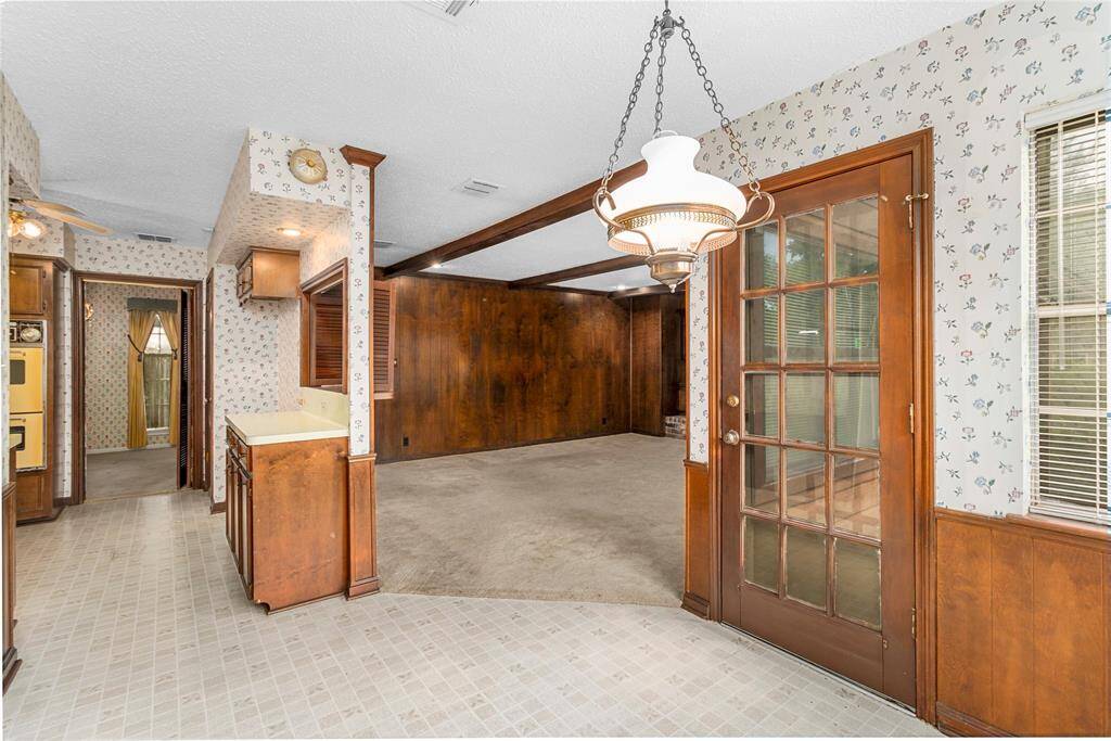 Breakfast Room w/French Door access to Back Patio! Connects to Kitchen & Family Room! Formal Dining Room through the Kitchen! Laundry Room & Guest Bath to the LEFT!