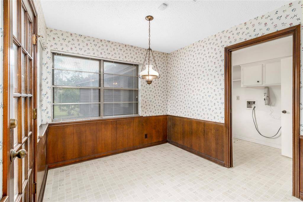 Breakfast Room w/French Door access to Back Patio! View of Park-like Backyard! Connects to Kitchen & Family Room! Laundry Room & Guest Bath to the RIGHT!