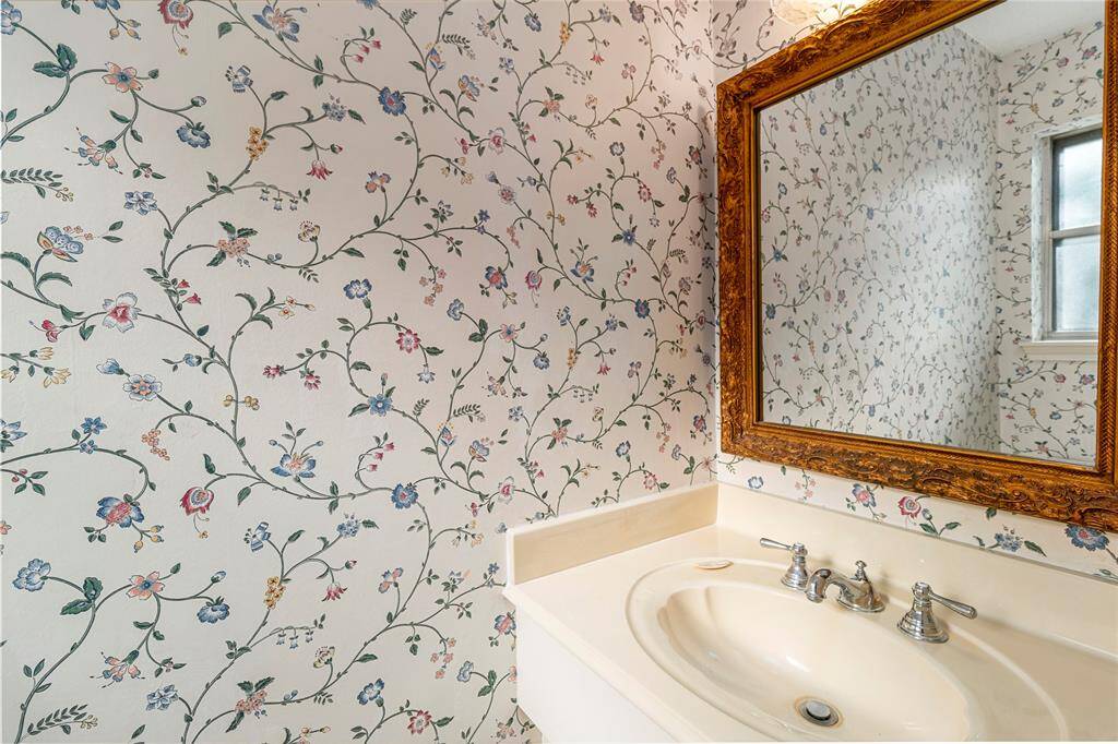 Guest Bath connects to Laundry Room! Quick access from the Backyard! Could be a Pool Bath!