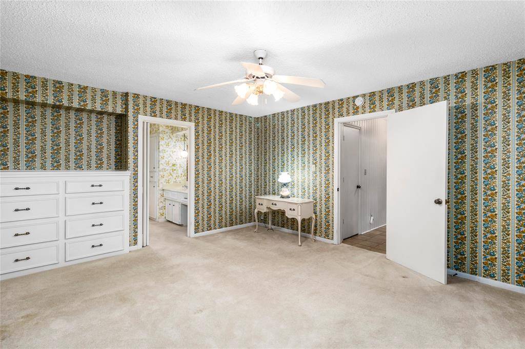 SPACIOUS & PRIVATE Owner's Suite! Plenty of Room for King Bed & Sitting Area! Built-in Dresser! Connects to Spa-like Ensuite Bath and Hallway w/Storage Closet under the Stairs!