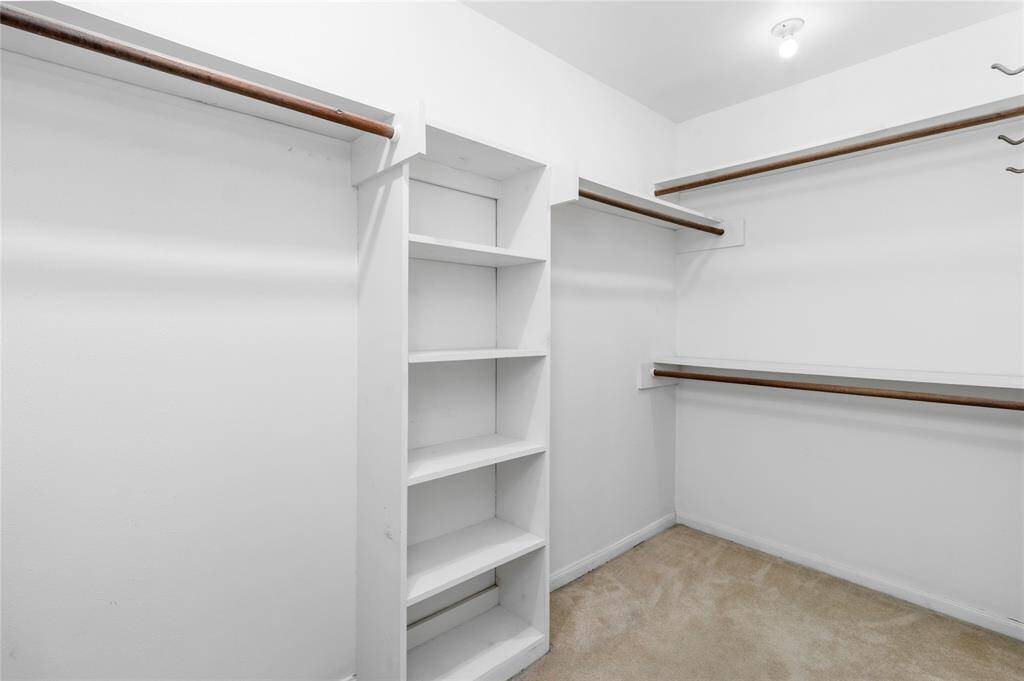 Owner's Suite Walk-in Closet w/Built-in Cabinets!