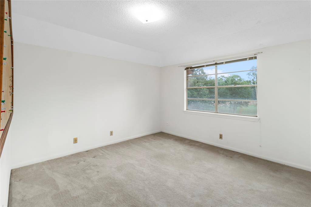 Large Bedroom #2 with view of the Park-like Backyard! All Bedrooms have Walk-in Closets!