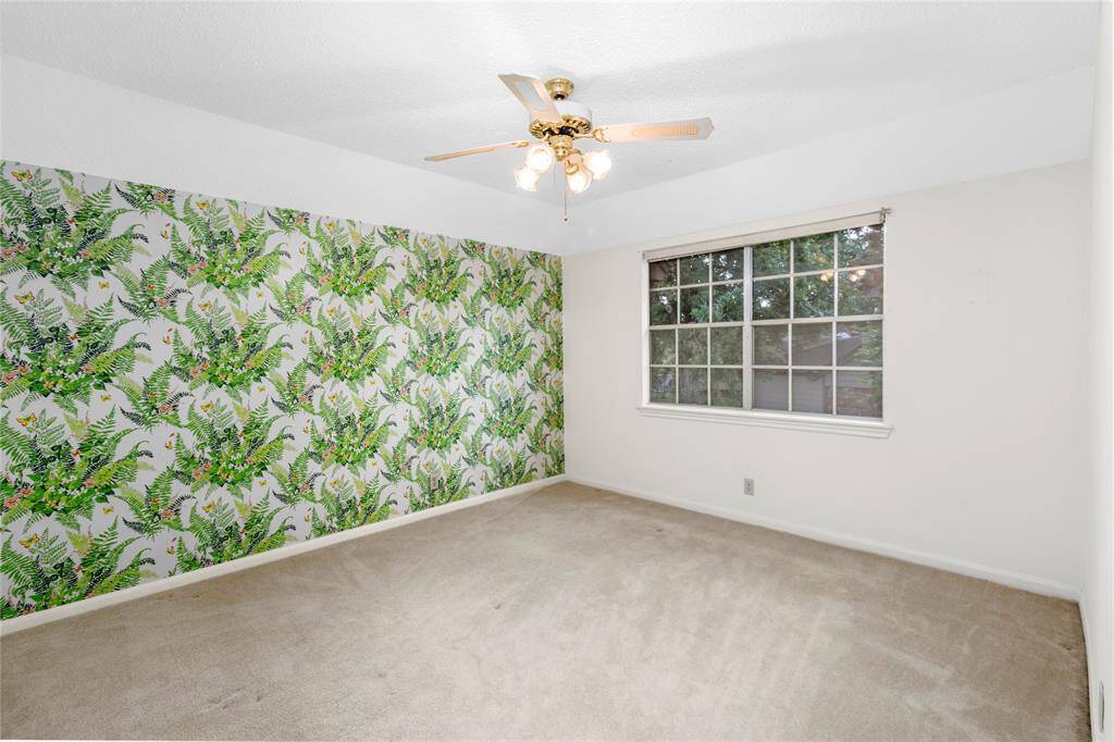 Large Bedroom #3 with view of the Park-like Side Yard! All Bedrooms have Walk-in Closets!