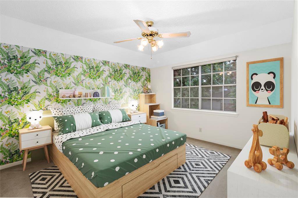 VIRTUALLY STAGED PHOTO! Large Bedroom #3 with view of the Park-like Side Yard! All Bedrooms have Walk-in Closets!