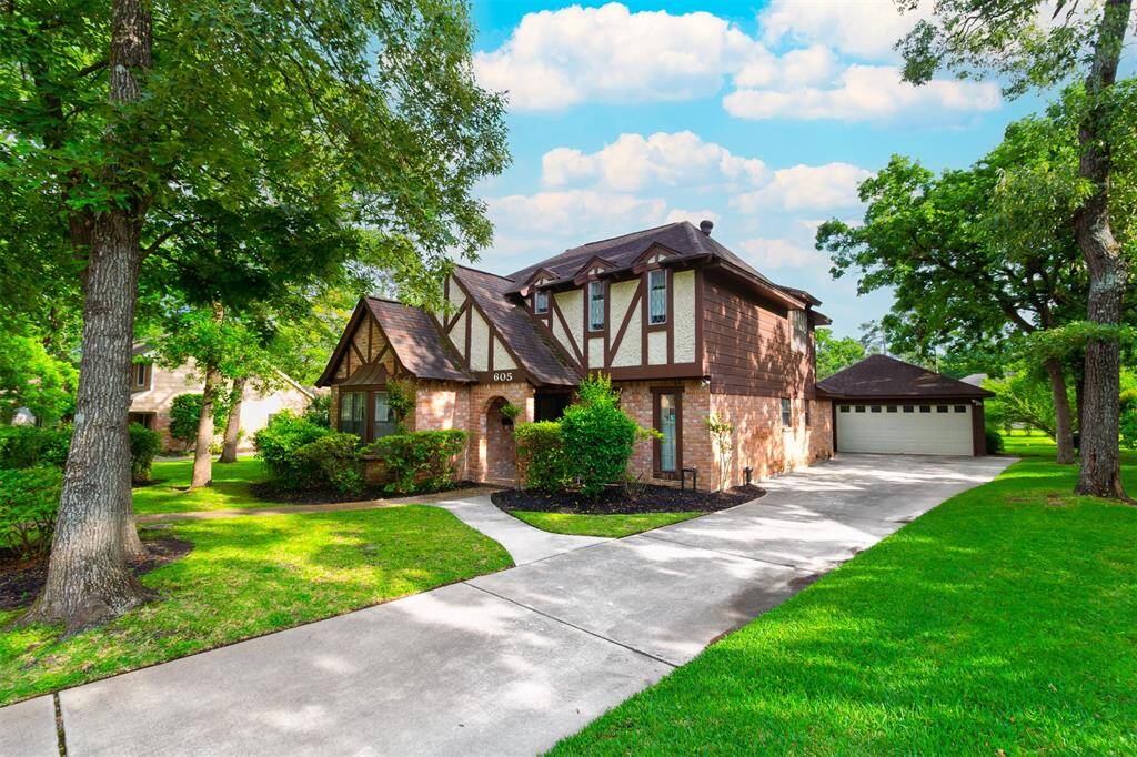 CHARMING 4 BEDROOM + 2.5 BATH TWO-STORY HOME LOCATED ON A TRANQUIL TREE-LINED STREET IN THE HIGHLY DESIRABLE RIVERSHIRE NEIGHBORHOOD! NO FLOODING! OLD GROWTH TREES & LUSH LANDSCAPING! Detached Garage w/Long Driveway!