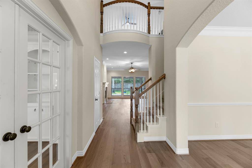 Entryway with home office to your left and formal dining to your right