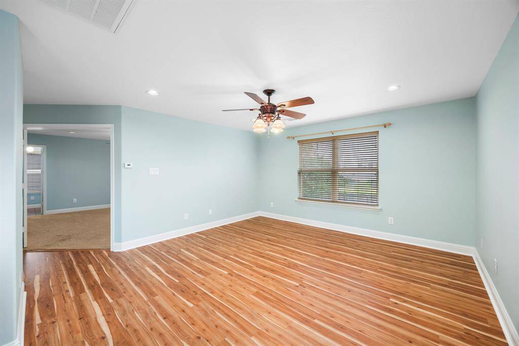 Walk upstairs to the Gameroom also equipped with a ceiling fan for comfort.