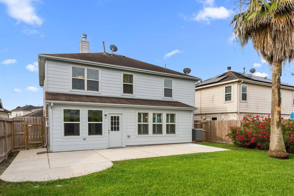 Oversized patio slab perfect for outdoor furniture and entertaining. Beautiful landscaping and no back neighbors makes this a peaceful oasis.