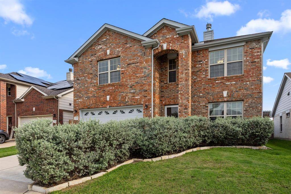 Beautiful native Texas Sage lines the entryway, inviting birds and pollinators with its beautiful purple flowers. It is drought hardy and low maintenance.