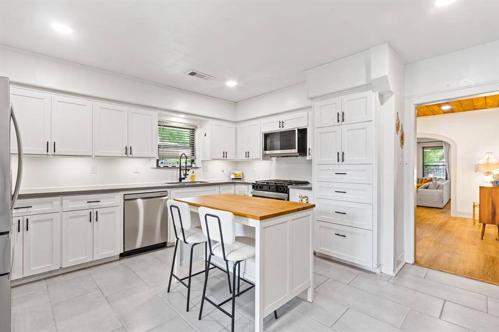 Built in kitchen storage, plus a walk-in pantry
