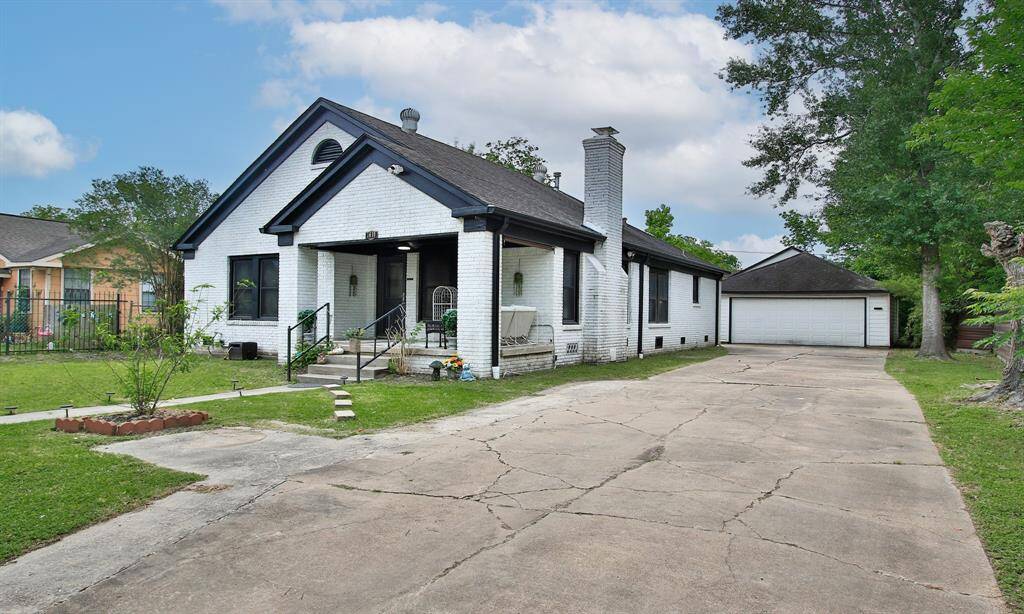 The property is fully fenced with an automated driveway gate and an oversized 3-car garage!