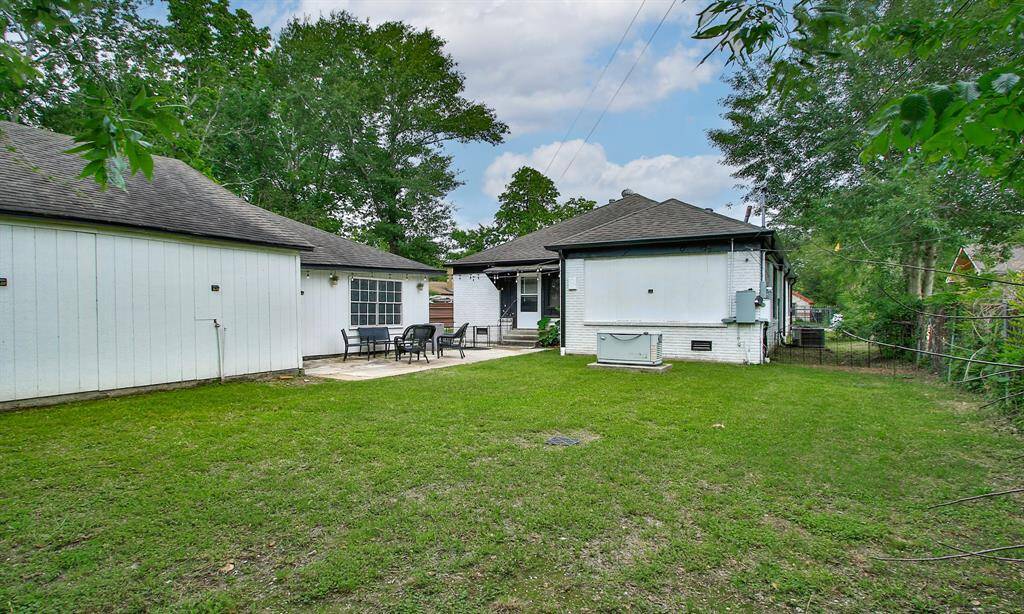 Spacious backyard with full-home Generac generator.