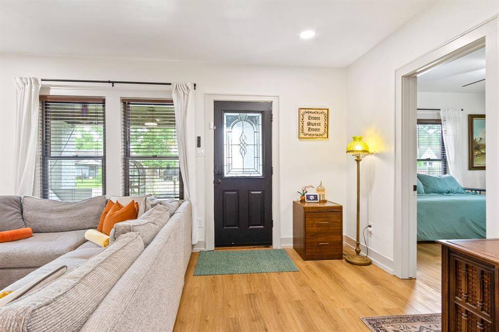 Another view of the living room, facing the front door