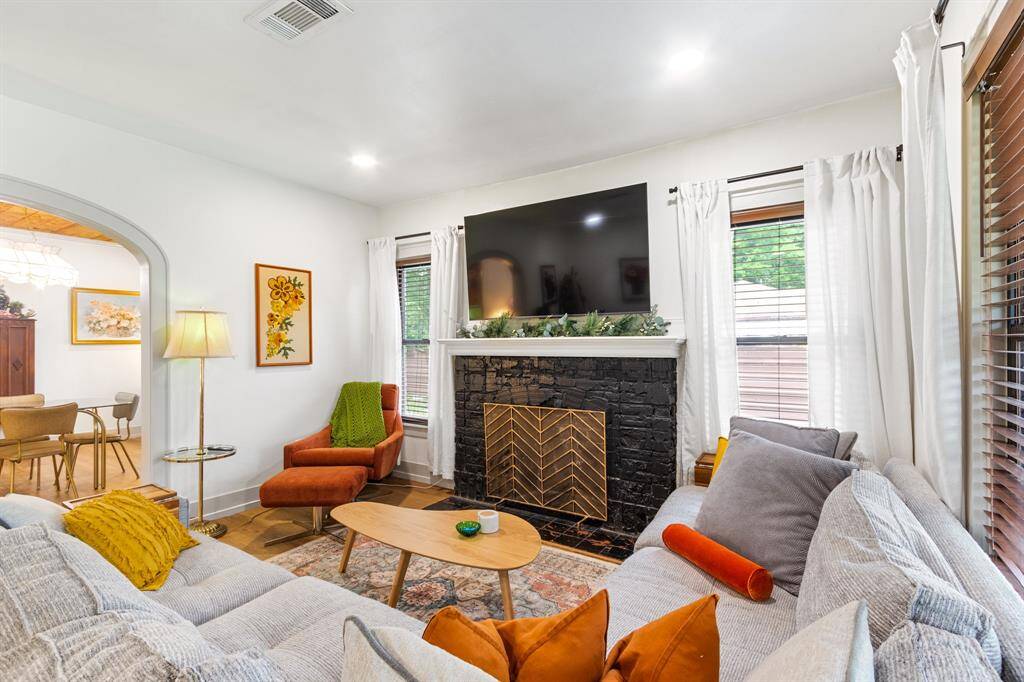 Living room with wood-burning fireplace