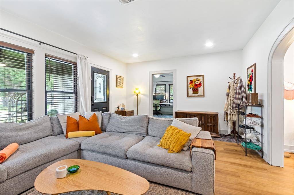 The living room connects to the dining room and one of the guest bedrooms
