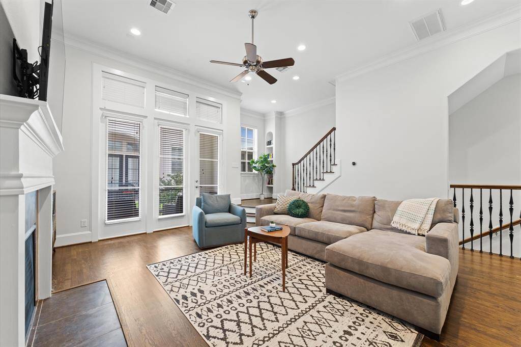 Bright and spacious living room filled with natural light.