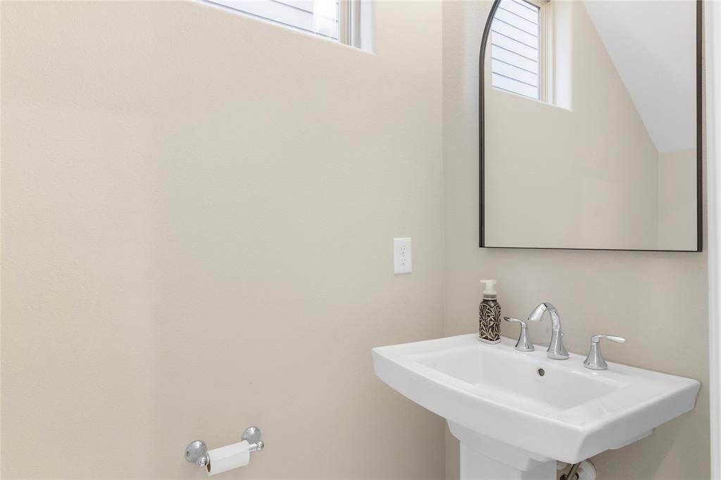 Convenient downstairs half bath for guests.