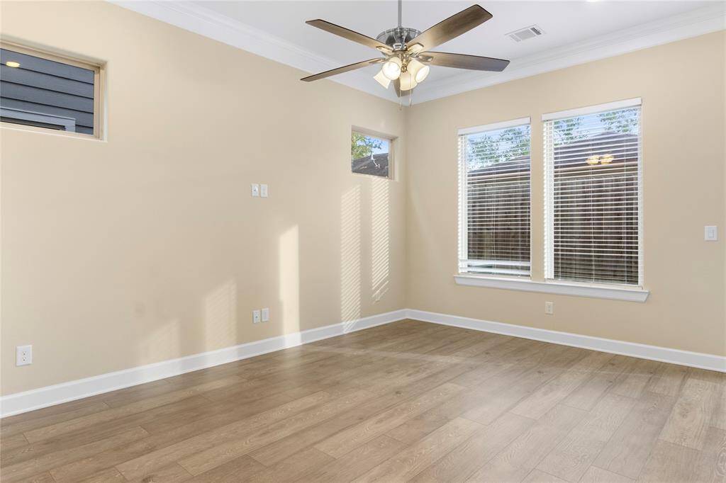 Bright and airy living room with ample space and abundant natural light.