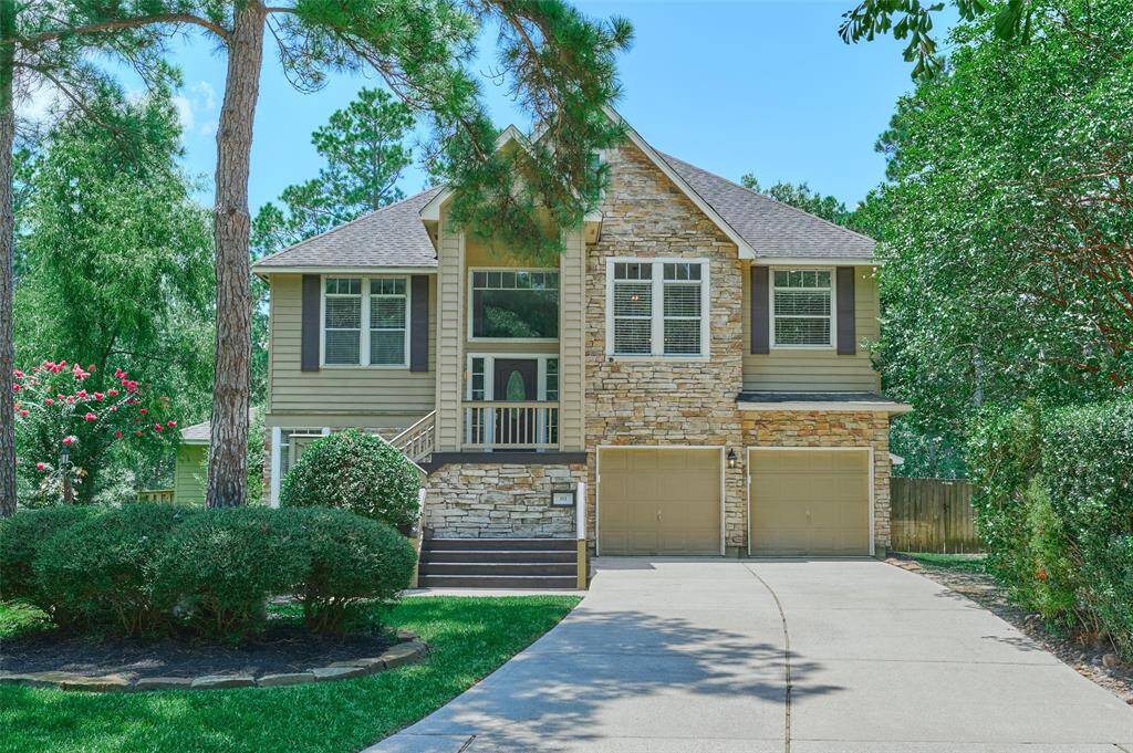 This lush .46 acre lot backs to a greenbelt and is flanked with a reserve giving ultimate privacy.