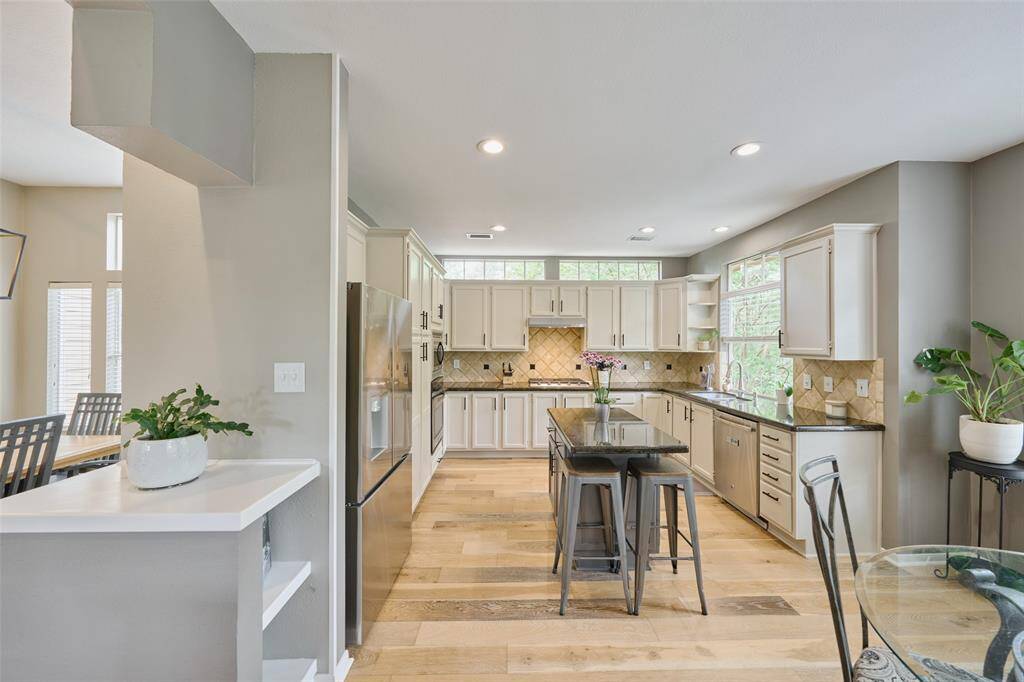 The kitchen cabinets have been painted in beautiful Revere Pewter.