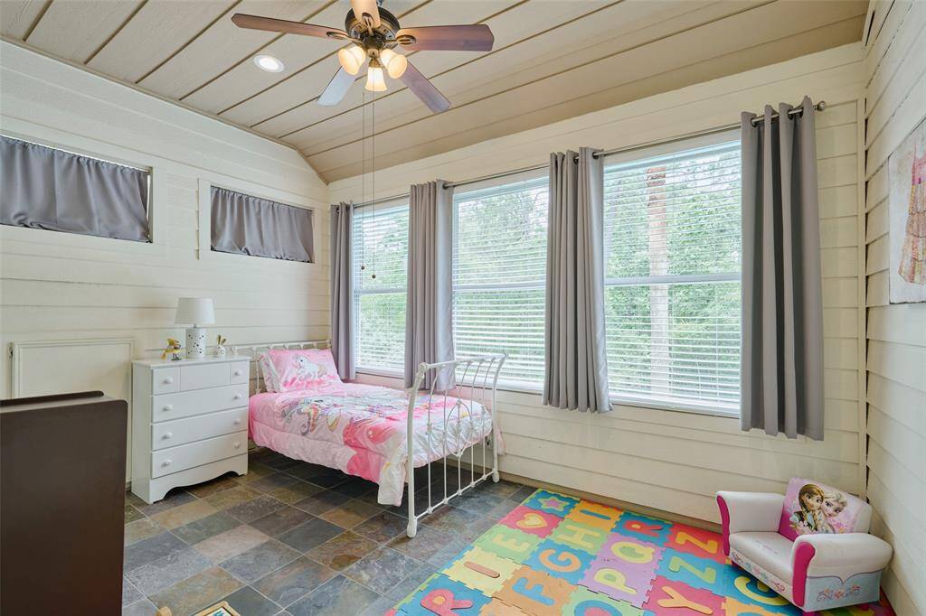 Half bath located off the upstairs family room.