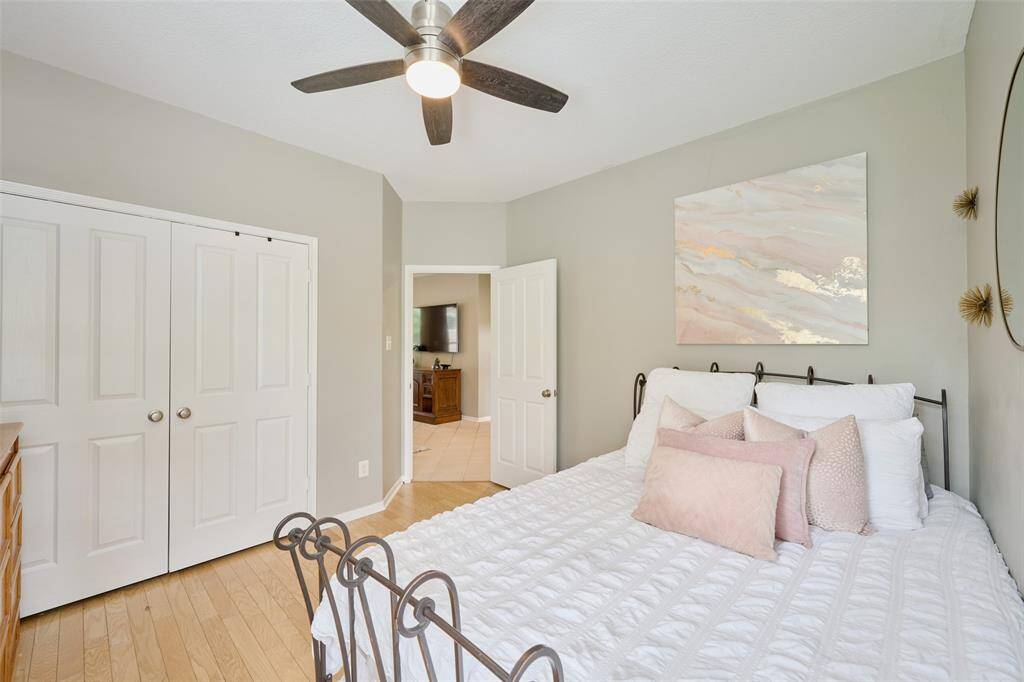 With a beautiful view of the backyard, the guest suite easily accommodates a king bed with plenty of additional space and includes a walk-in closet and private bath.