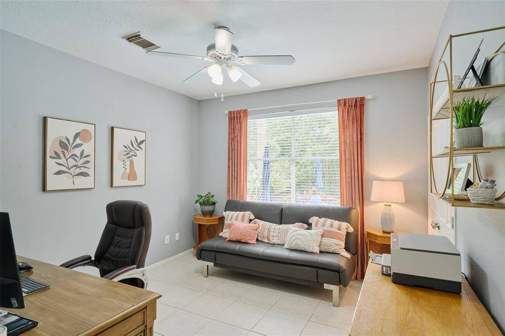 More picturesque backyard views from this bedroom with walk-in closet.