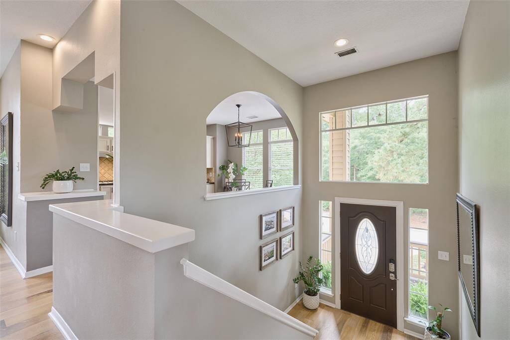 The double sided gas fireplace is the perfect divider between the family and dining rooms.