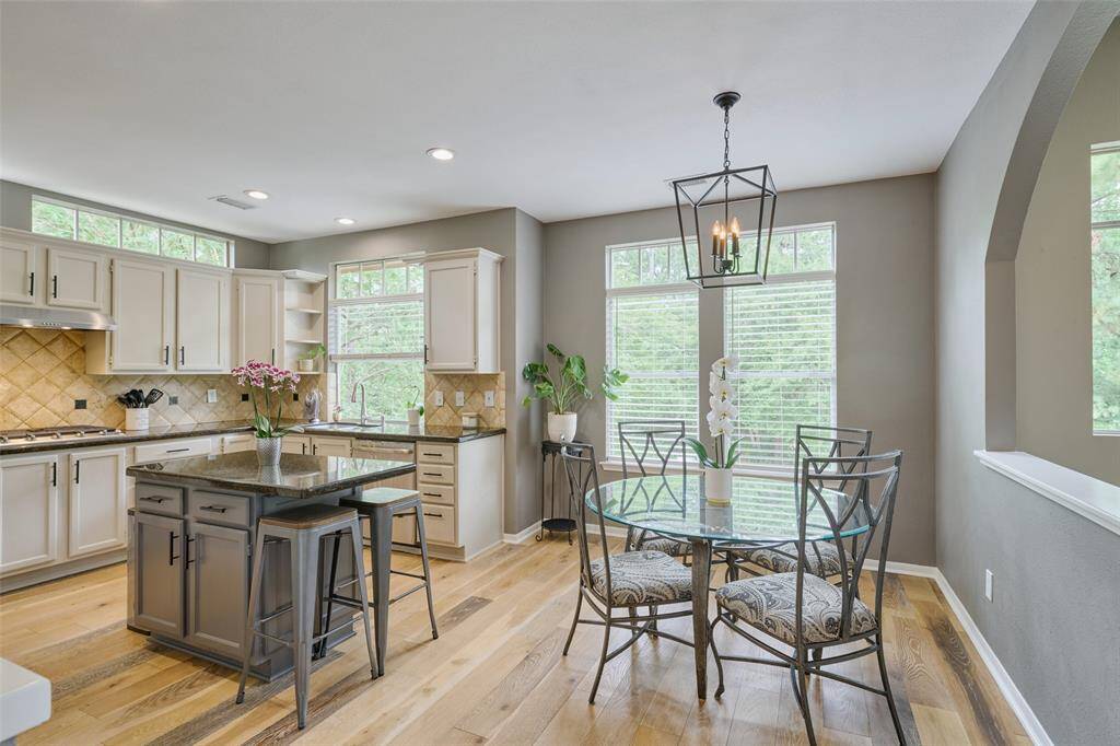 The kitchen boasts all stainless steel appliances.