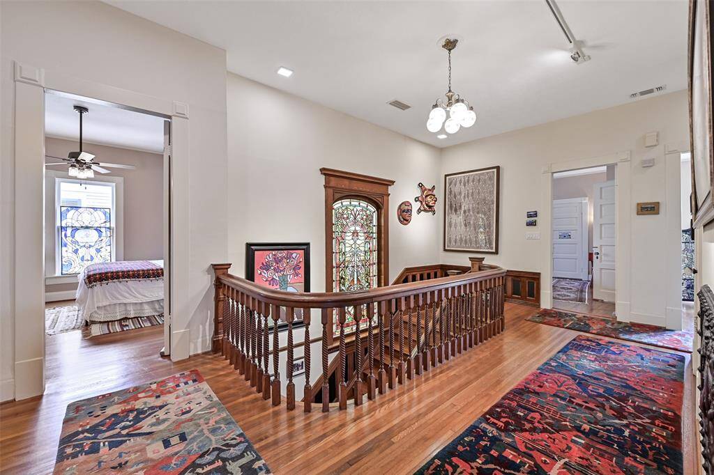 Generous Stairwell Landing Provides Separate Access to Each Bedroom, Utility Room, Guest Bath and Additional Half Bath, In Addition to Stairs Leading to the Third Floor and Servants Staircase.