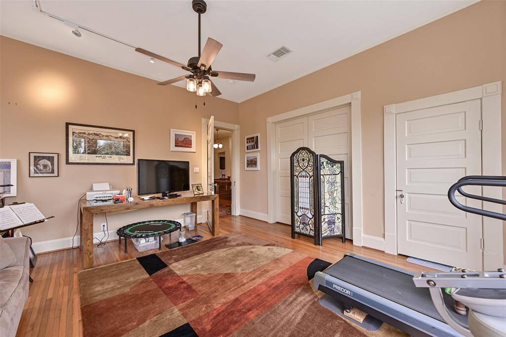 Another Perspective Showing the Guest Room, Currently Being Used for a Den/Workout Room.