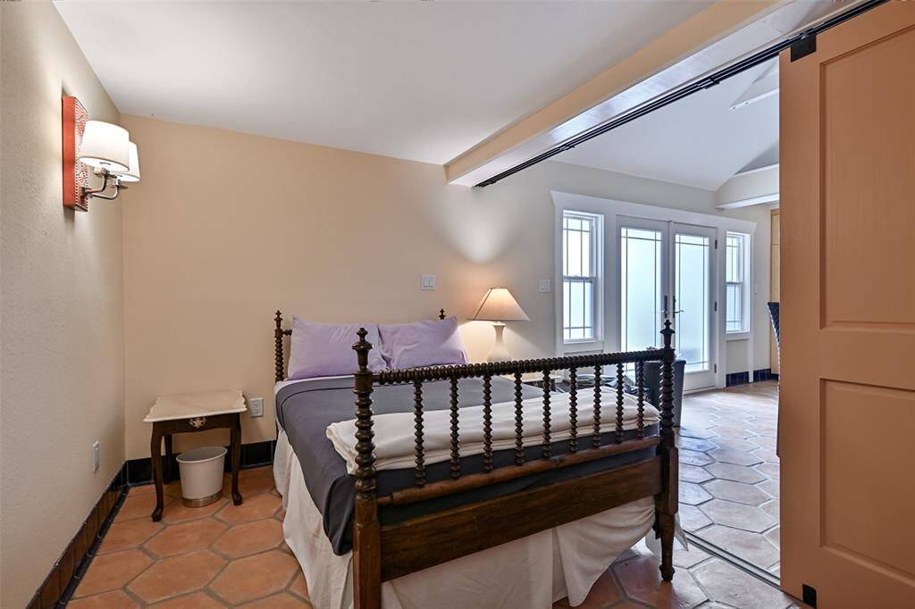 A Portion of the Bedroom Area in the Cabana with Sliding Privacy Doors and Two Upper Loft Areas that can be Accessed by Ladders for Over-Flow Guests. Those Ladders Are Not Currently Located in the Cabana for Safety Reasons!