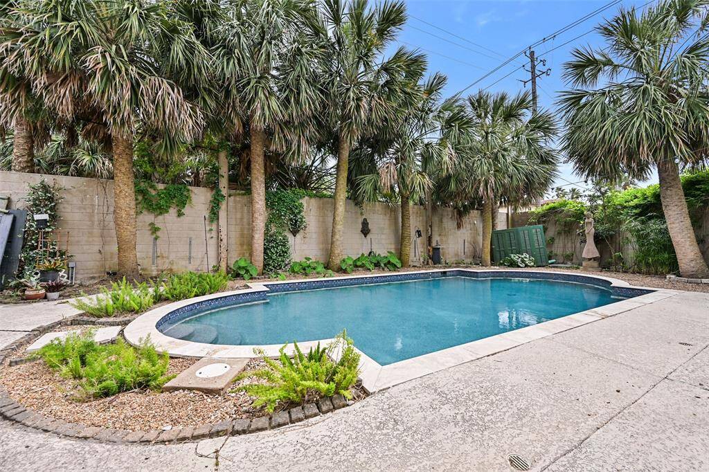 Another Photo Showing the Copious Pool Decking - Lots of Entertaining Areas! Note the High Privacy Fence Obstructs Views from the Street and Other Neighboring Homes! Midnight Dip Anyone - in Your Fabulous Pool?