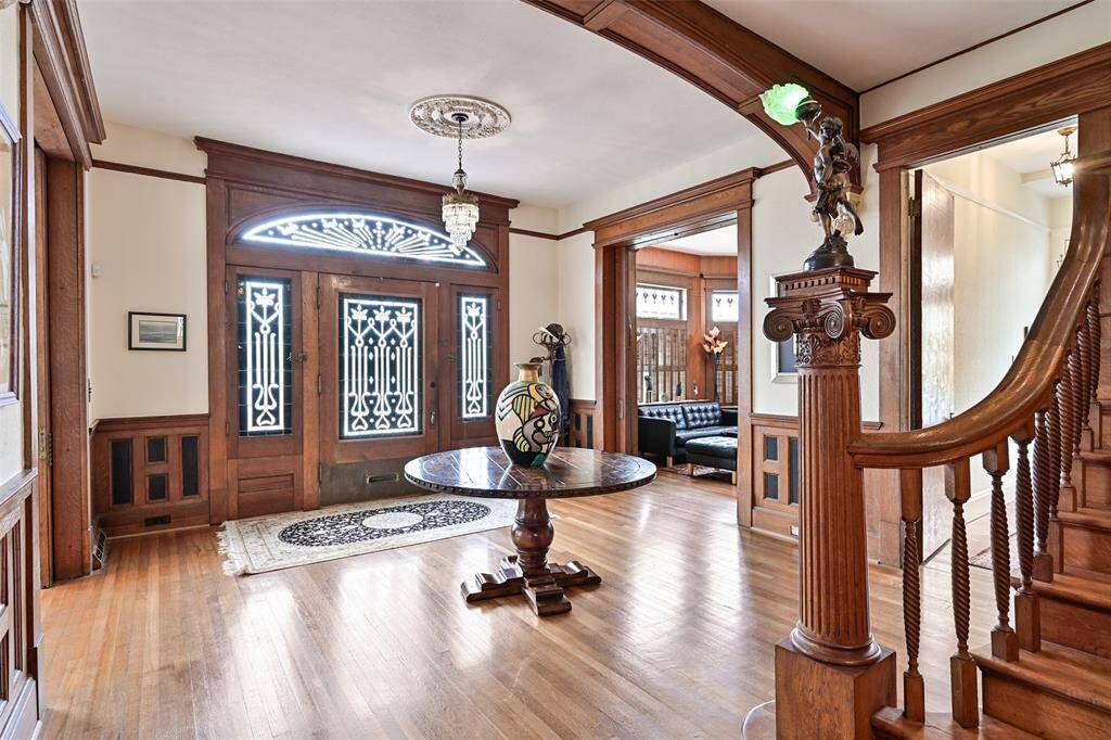 Metal Work on the Front Entry Door and Side Windows Provide Immediate Interest - Both from the Interior and Exterior of this Home!
