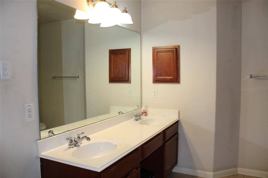 Double sinks in primary bathroom.